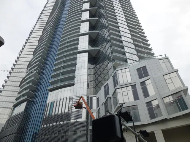a lobby with furniture and window