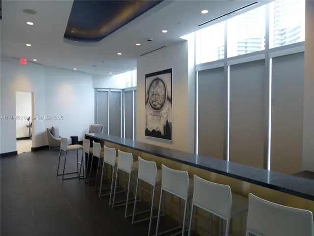 a view of swimming pool from a balcony