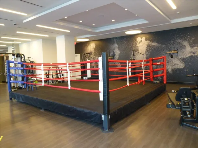 a picture of a bathroom with a glass shower door
