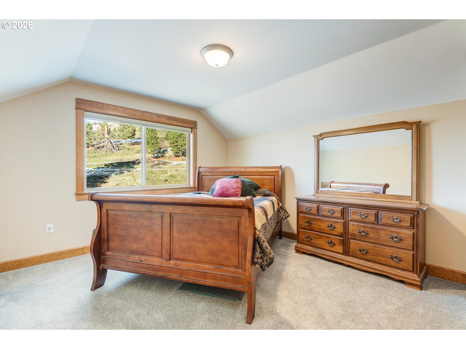 61615 High Valley Road Union, OR 97883 - Photo 28 of 47 a bedroom with a bed and a dresser