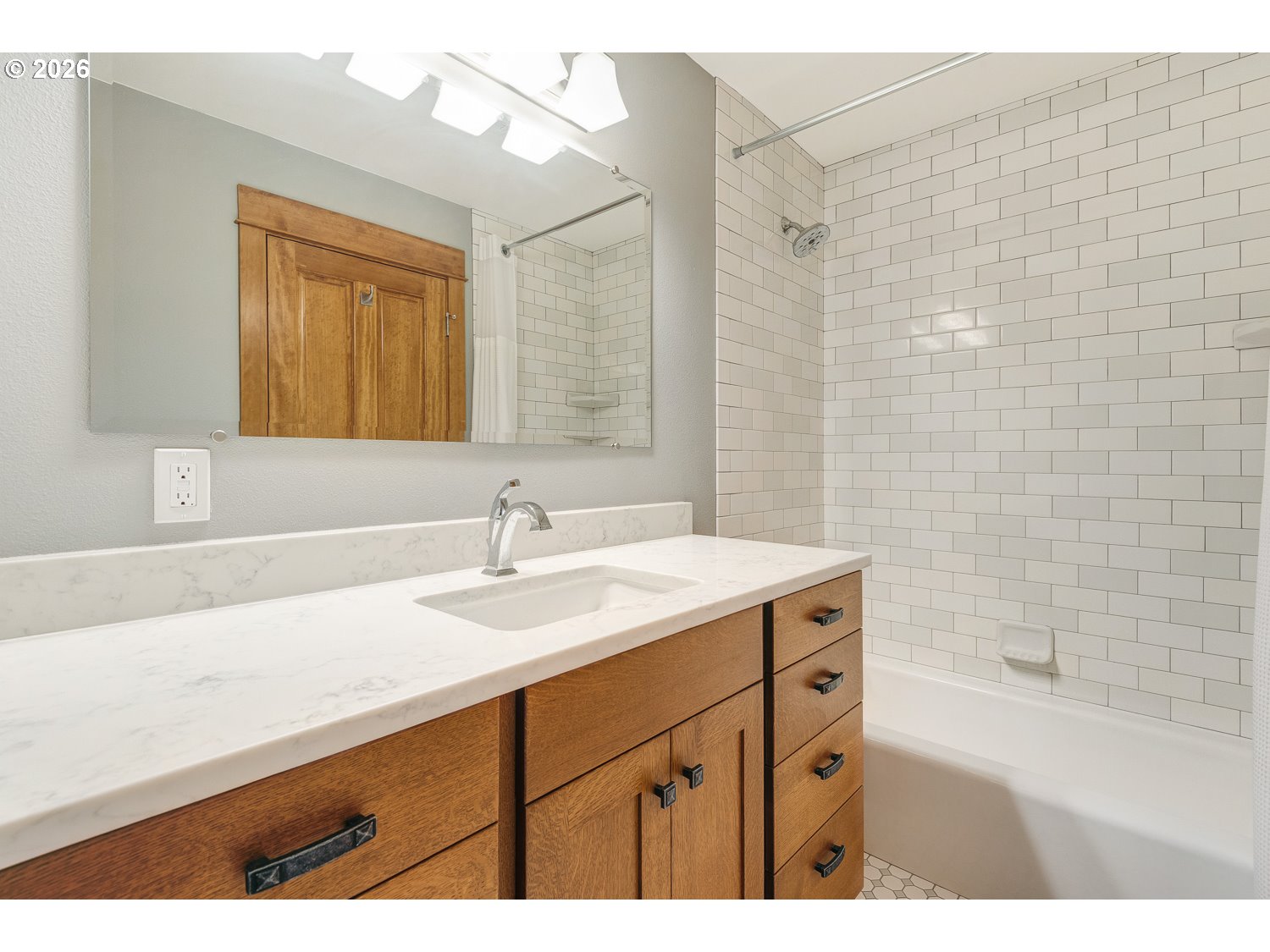 61615 High Valley Road Union, OR 97883 - Photo 30 of 47 a bathroom with a sink double vanity granite tub shower and a mirror