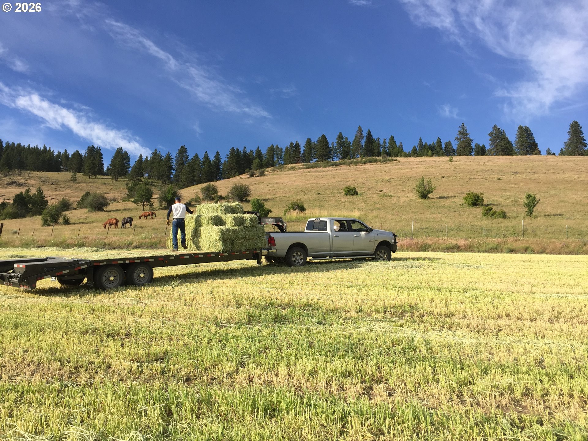 61615 High Valley Road Union, OR 97883 - Photo 40 of 47 a view of a lake with houses in the background