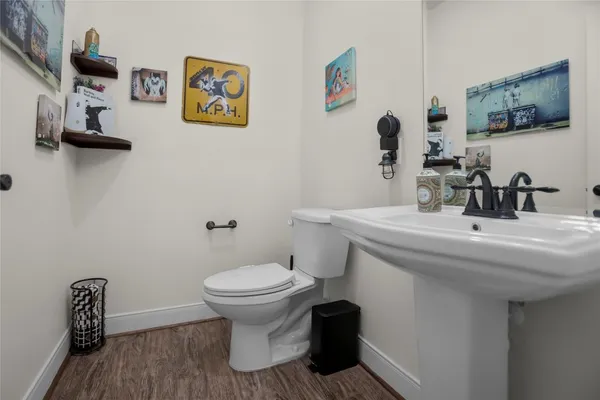 a bathroom with a sink and a toilet