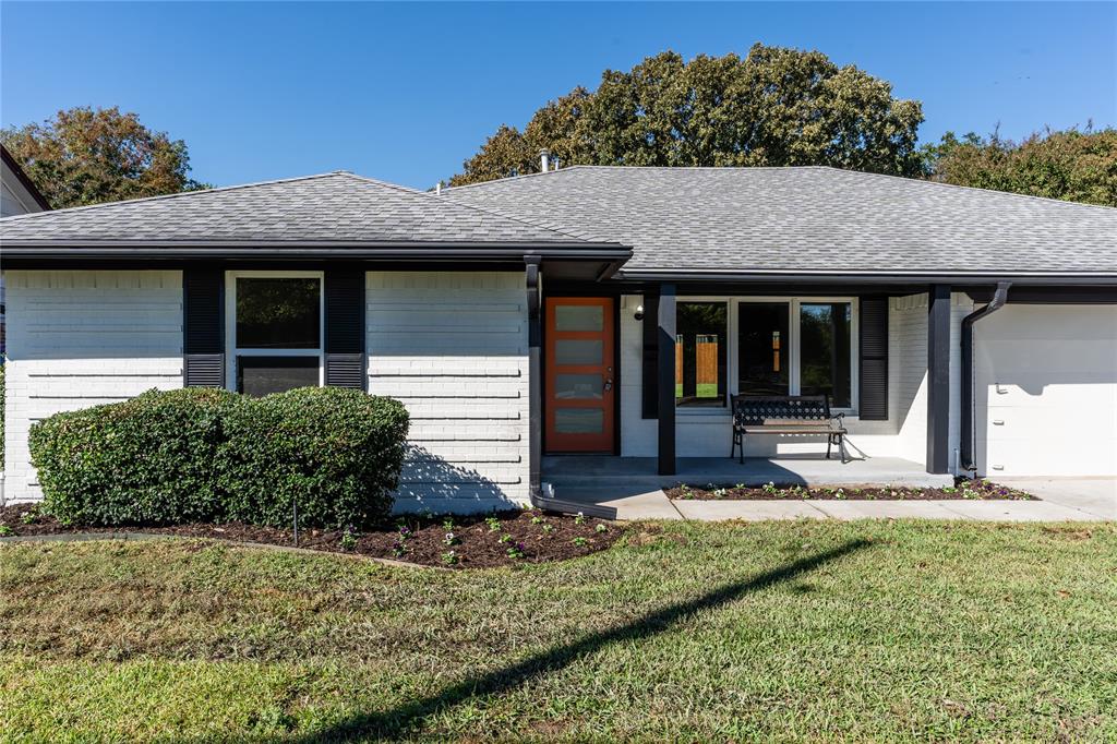 9225 Plano Road Dallas, TX 75238 - Photo 3 of 24 a front view of a house with garden
