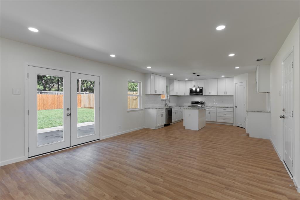 9225 Plano Road Dallas, TX 75238 - Photo 7 of 24 a view of kitchen with wooden floor