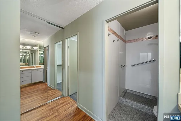a view of a bathroom from the hallway