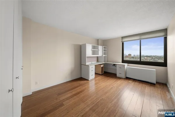 a large white room with a large window