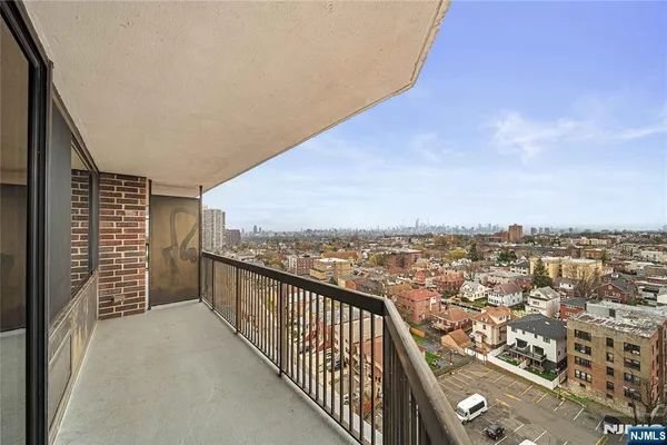 a view of balcony with city