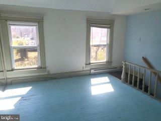 908 Hudson Road Cambridge, MD 21613 - Photo 13 of 21 Rear Bedroom W/ Stairs