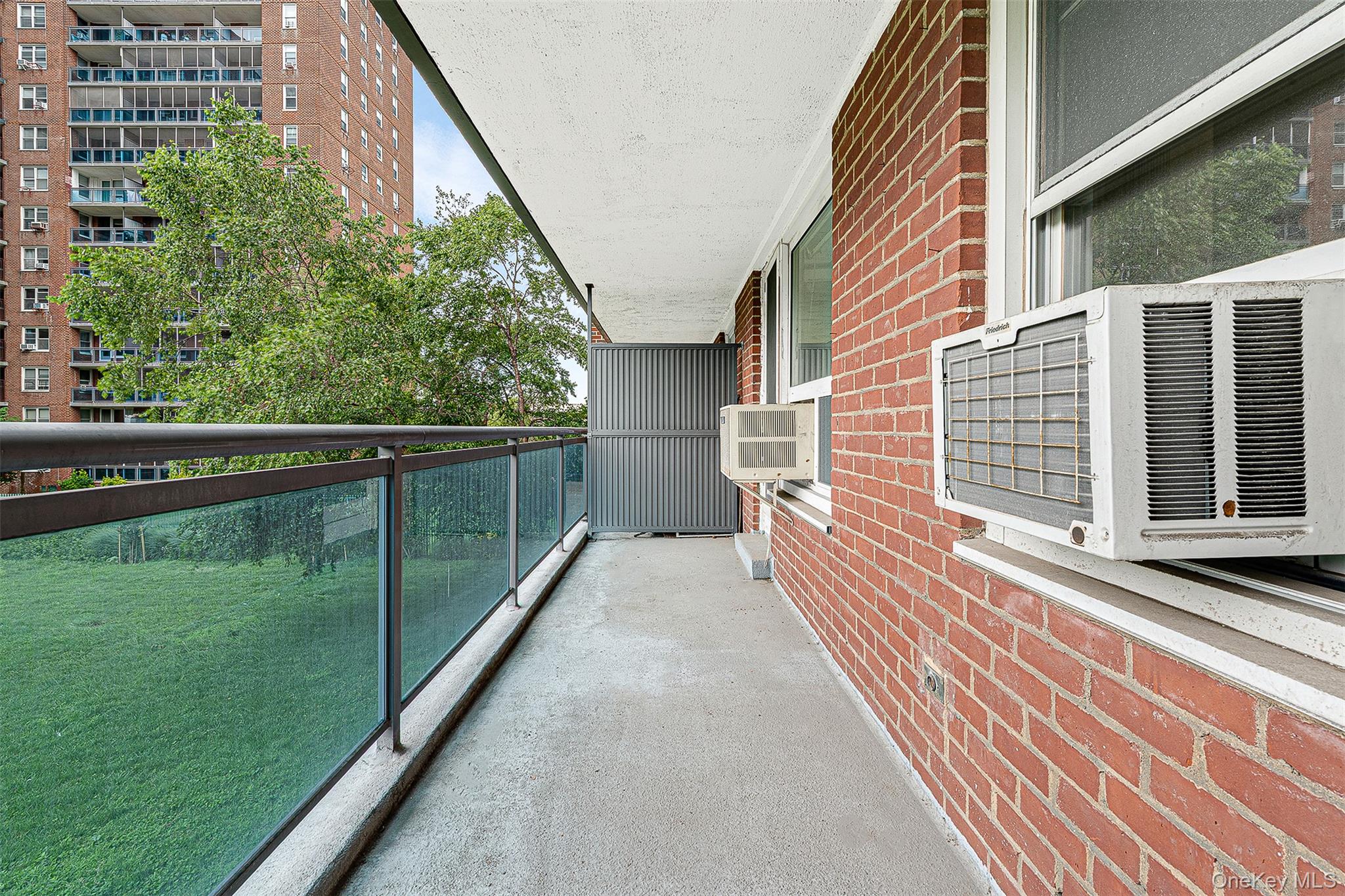 97-37 63rd Road, Unit 2/B Queens, NY 11374 - Photo 12 of 26 a view of a house with a balcony