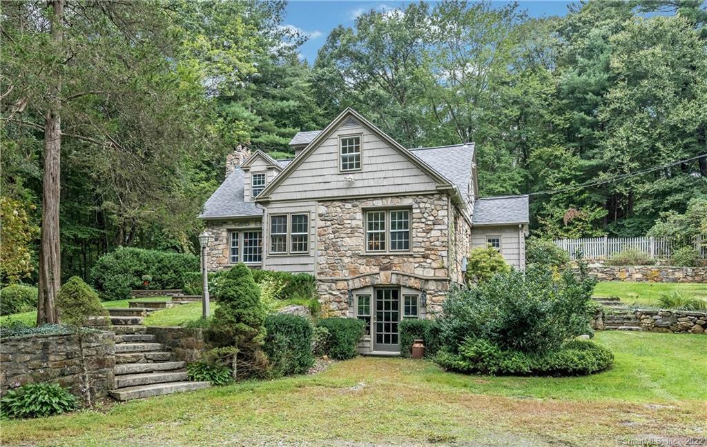 117 Limekiln Road Redding, CT 06896 - Photo 1 of 1 a house view with a garden space
