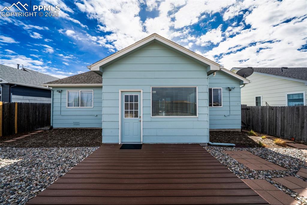 8072 Oliver Road Peyton, CO 80831 - Photo 27 of 30 a view of a house with a yard