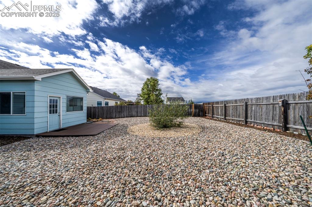 8072 Oliver Road Peyton, CO 80831 - Photo 28 of 30 a front view of a house with a yard