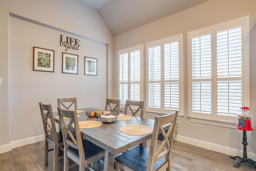 11829 Kynborrow Road Fort Worth, TX 76052 - Photo 18 of 39 a view of a dining room with furniture and windows