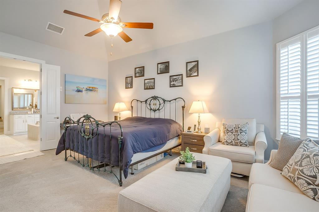 11829 Kynborrow Road Fort Worth, TX 76052 - Photo 22 of 39 a spacious bedroom with a bed and window
