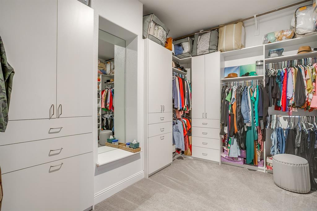 11829 Kynborrow Road Fort Worth, TX 76052 - Photo 27 of 39 a view of walk in closet with clothes