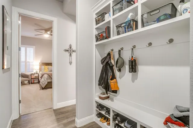 a balcony with table and chairs