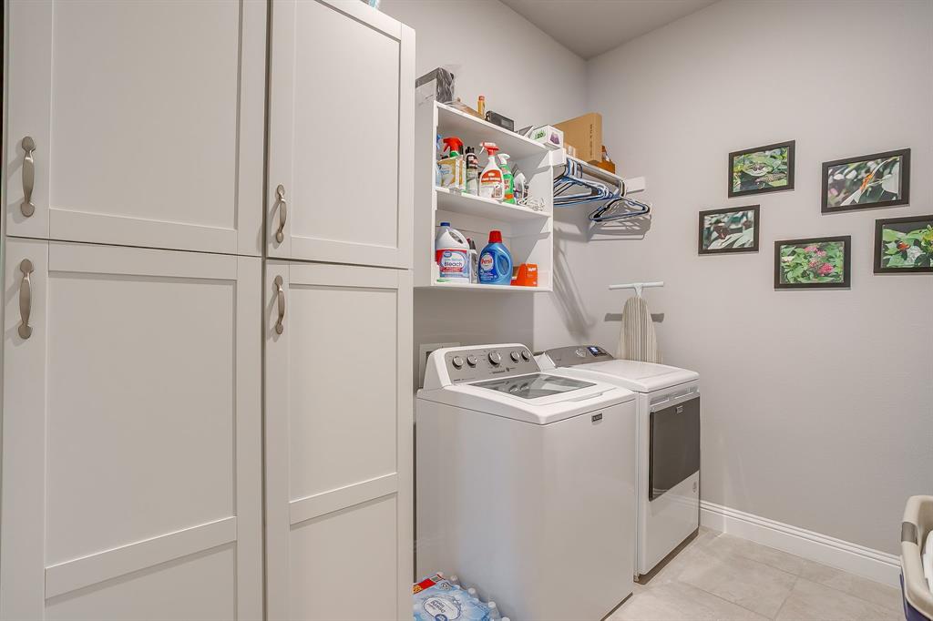 11829 Kynborrow Road Fort Worth, TX 76052 - Photo 33 of 39 a utility room with dryer and washer