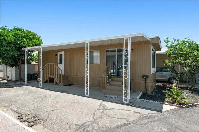 a view of backyard with cabin