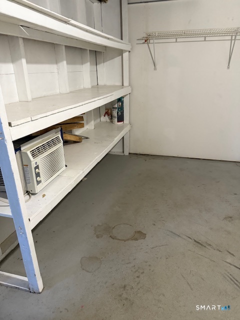 280 East Main Street, Unit E2 Clinton, CT 06413 - Photo 18 of 20 The basement storage room has shelving installed.