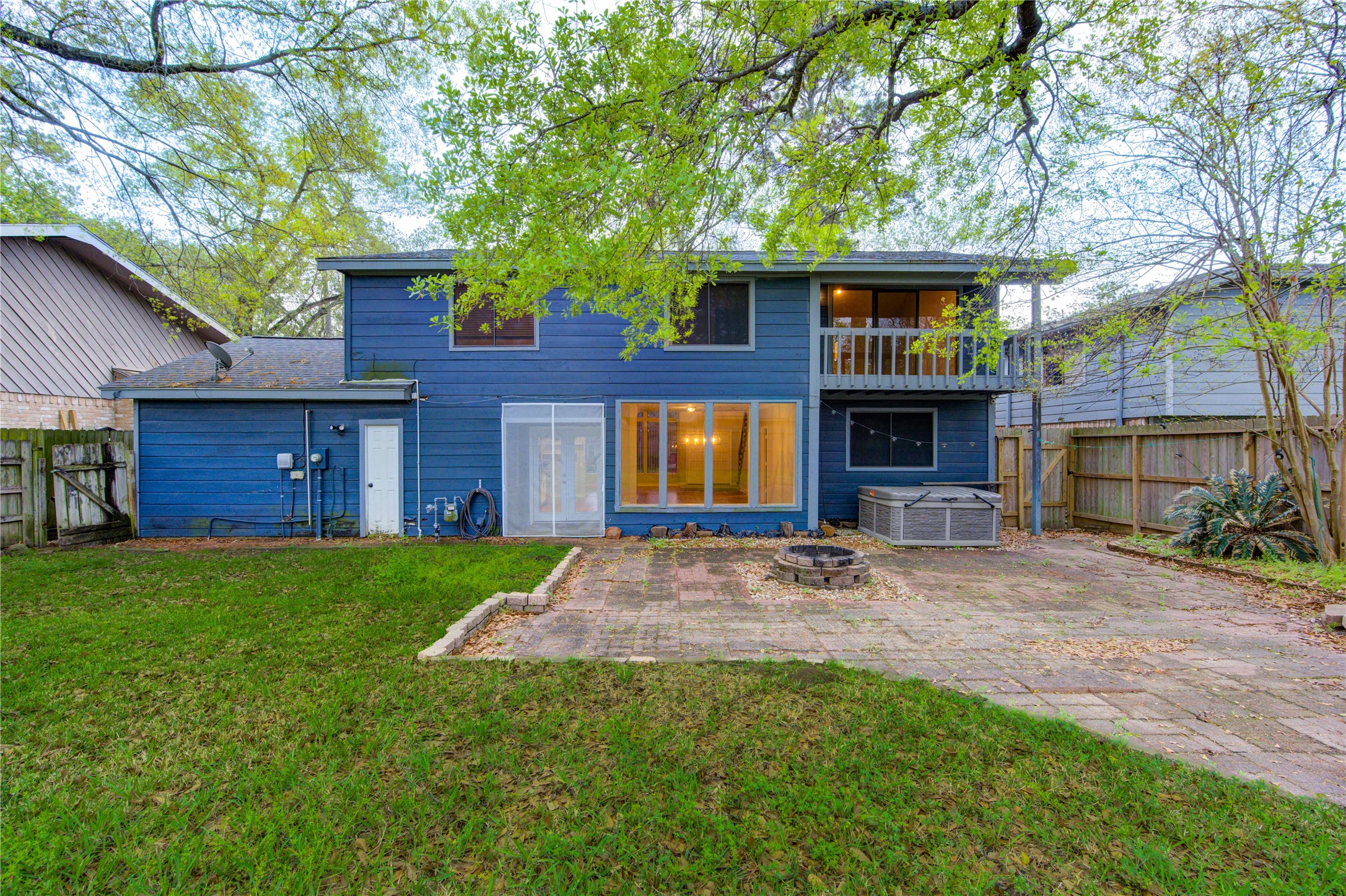 530 Enchanted Lane Spring, TX 77388 - Photo 24 of 26 a view of an house with backyard space and a tree