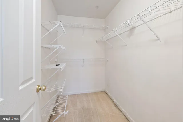 a view of a room with racks on the wall