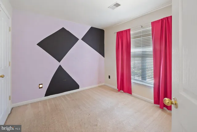 a view of a room with windows