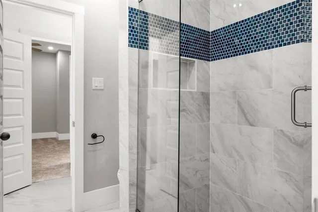 a bathroom with a granite countertop sink mirror and double