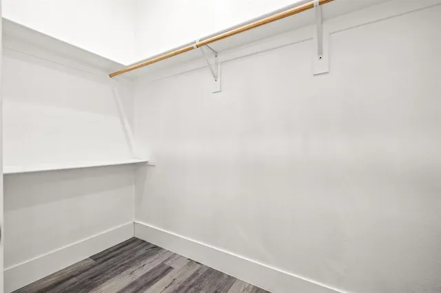 a view of a room with racks on the wall