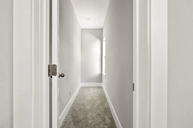 a bathroom with a double vanity sink and mirror