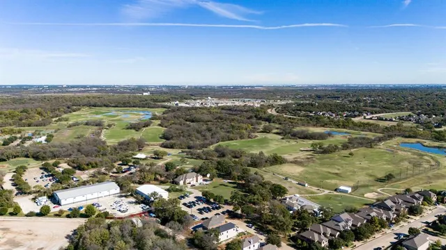 an aerial view of a residential houses and city view