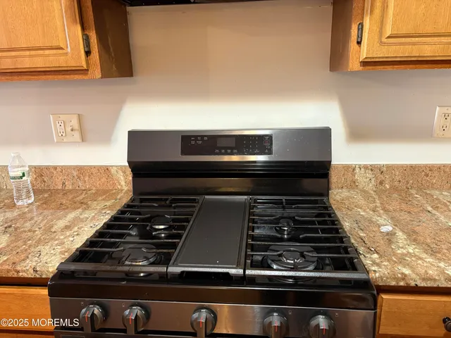 a view of roof with sitting area