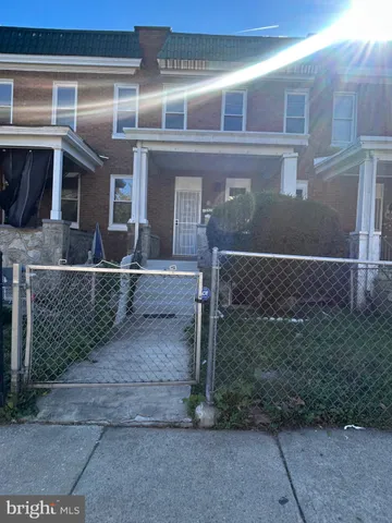 a front view of a house with garage