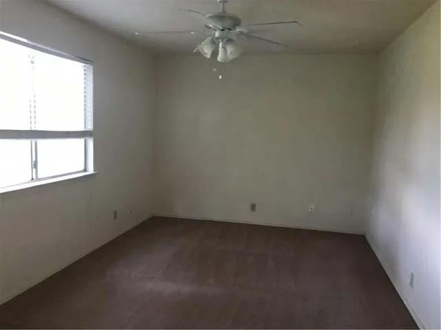 a view of a yard with an trees