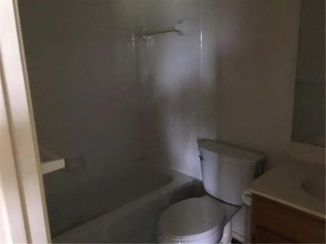 a view of backyard with green space