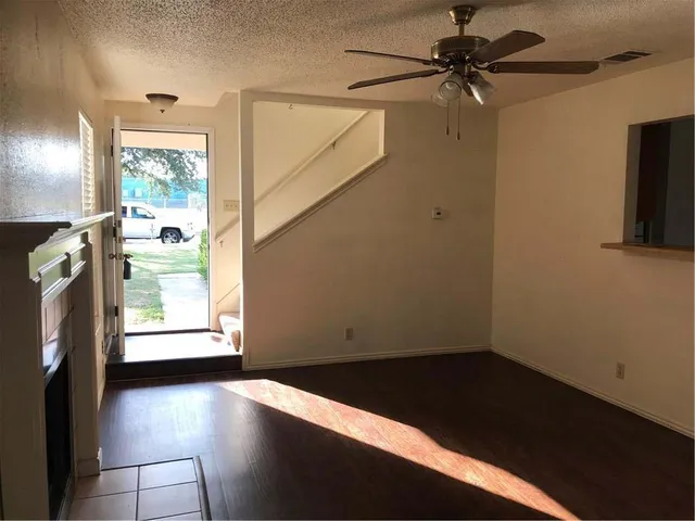 a kitchen with a sink appliances and cabinets