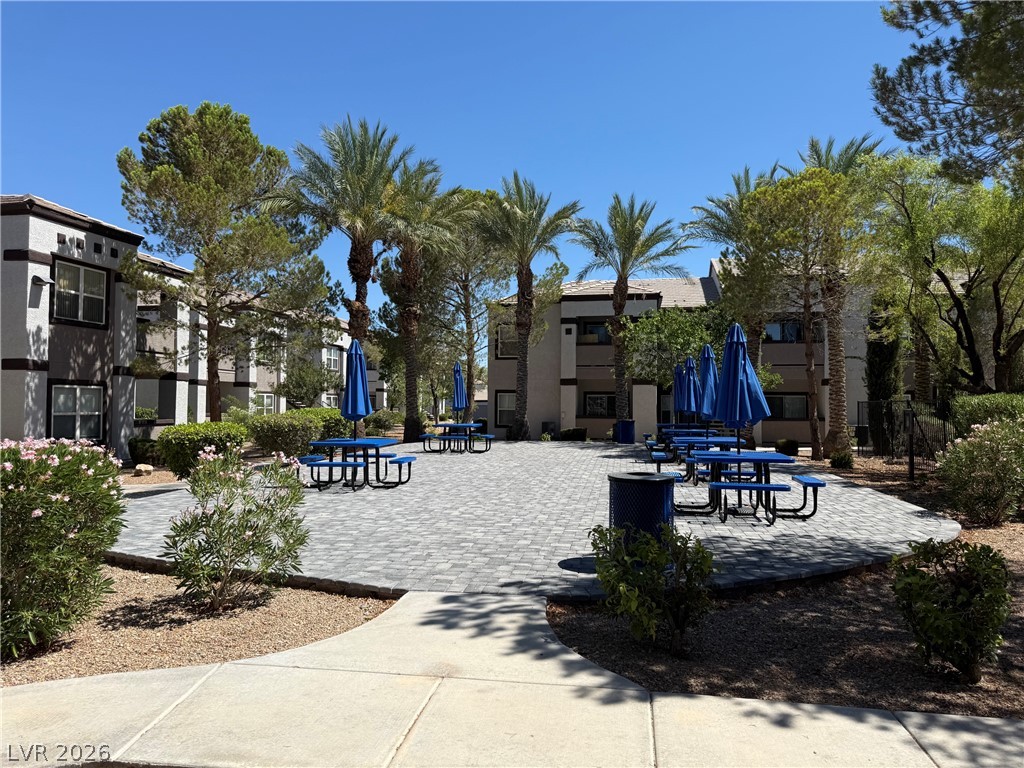 7255 West Sunset Road, Unit 2149 Las Vegas, NV 89113 - Photo 25 of 28 Picnic Area has lush landscaping and paved gathering areas define this inviting community space.