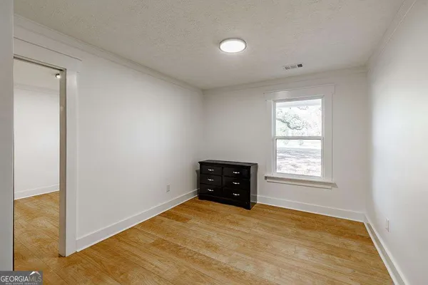 a bathroom with a toilet a sink and bathtub