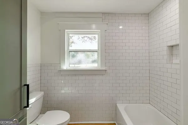 a view of a lake with a house