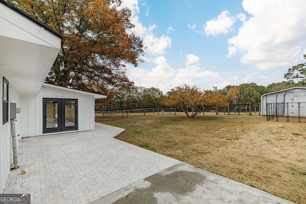 1410 Old Bishop Road Bishop, GA 30621 - Photo 42 of 73 a view of a lake with a house