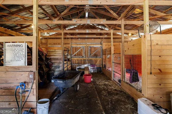 a view of a house with pool porch and yard