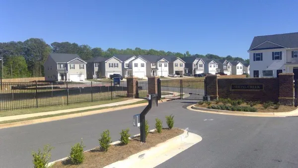 a view of a house with a swimming pool