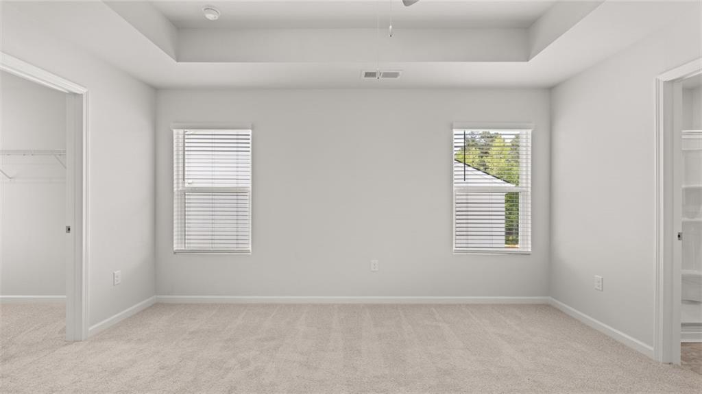 11923 Aukerman Way Hampton, GA 30228 - Photo 9 of 26 an empty room with windows