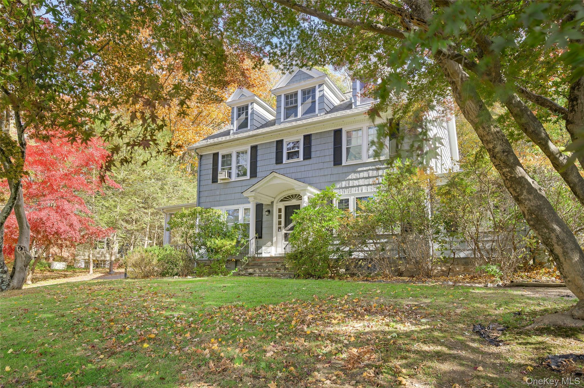 48 Mustato Road Katonah, NY 10536 - Photo 2 of 30 a front view of a house with garden