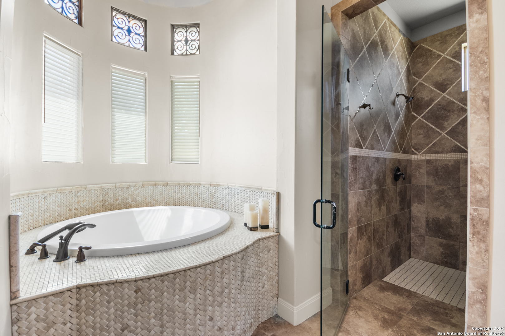 68 Brook Ridge Fair Oaks Ranch, TX 78015 - Photo 28 of 69 a bathroom with a tub a sink and a shower