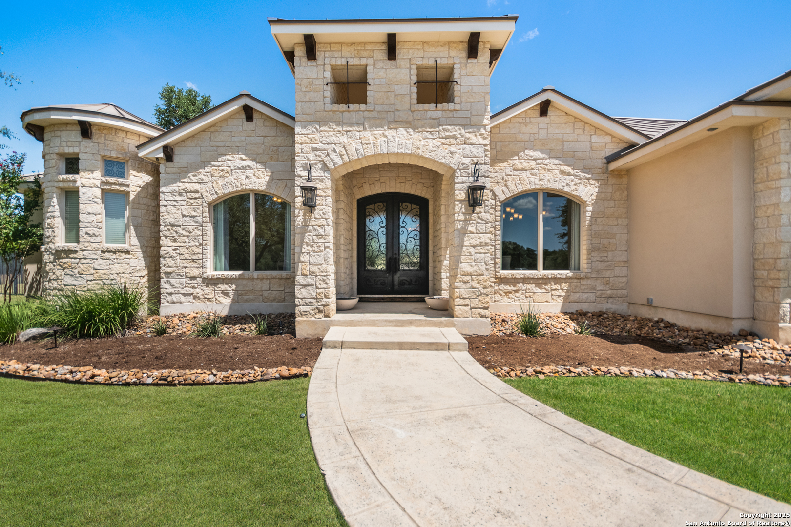 68 Brook Ridge Fair Oaks Ranch, TX 78015 - Photo 38 of 69 a front view of a house with garden