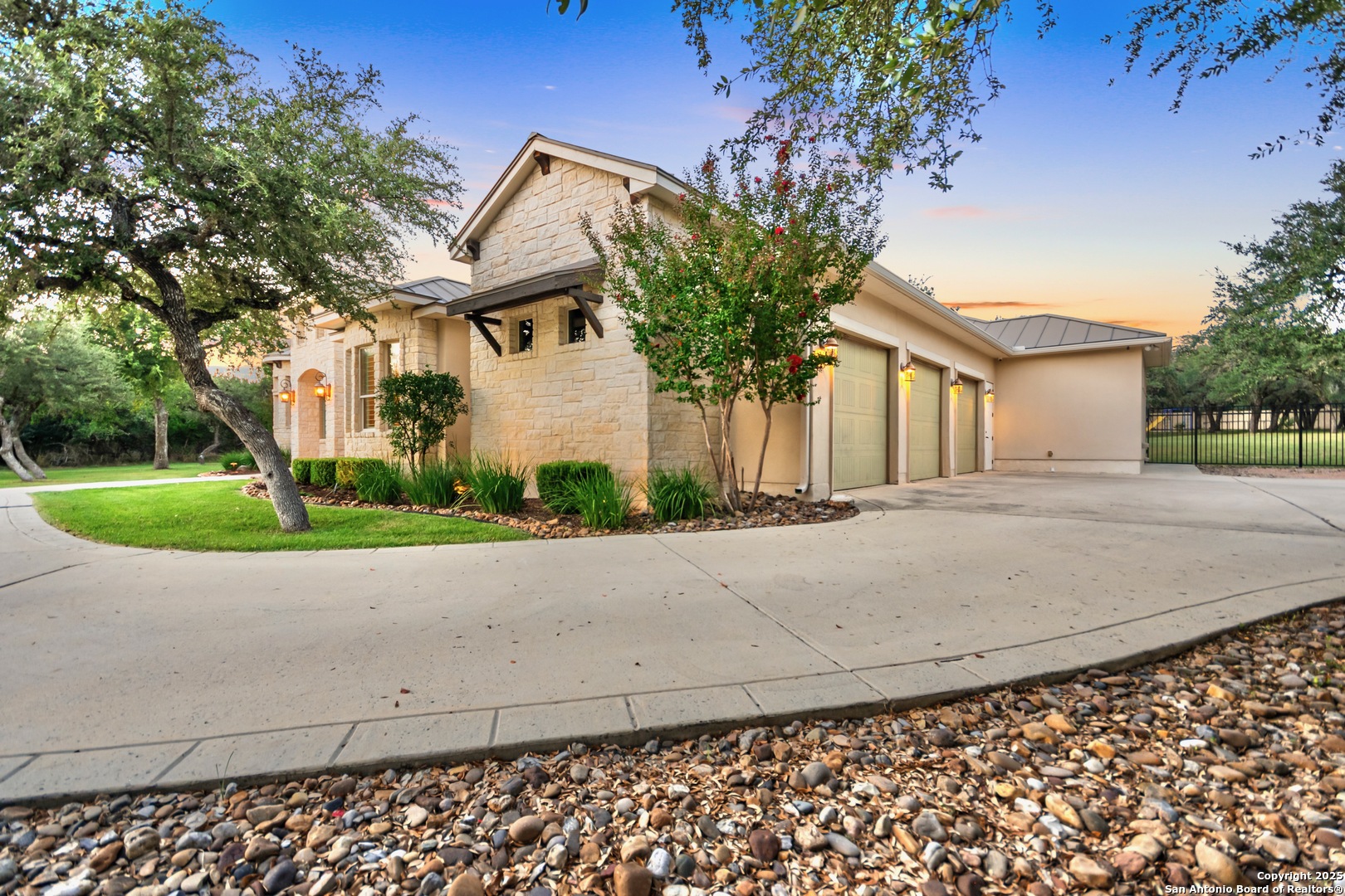 68 Brook Ridge Fair Oaks Ranch, TX 78015 - Photo 54 of 69 a front view of a house with plants and large trees