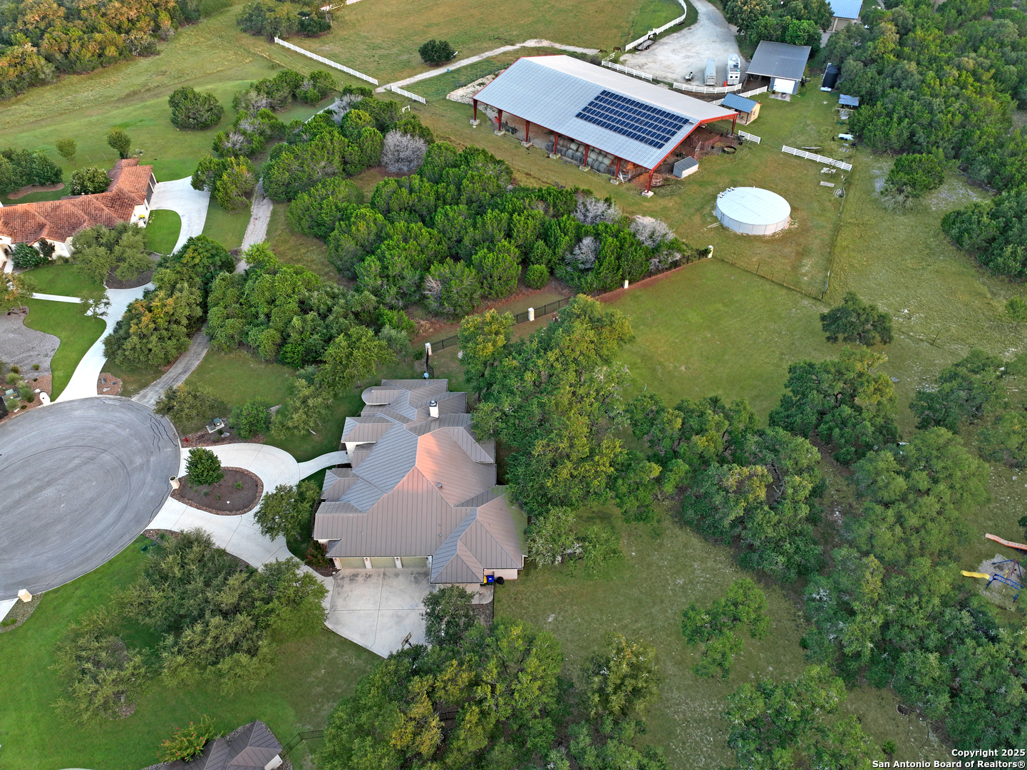 68 Brook Ridge Fair Oaks Ranch, TX 78015 - Photo 59 of 69 an aerial view of a house with garden space and street view