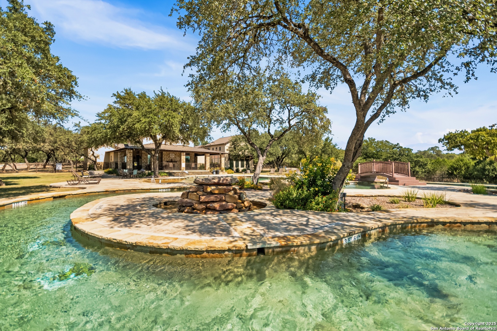 68 Brook Ridge Fair Oaks Ranch, TX 78015 - Photo 69 of 69 a view of swimming pool with outdoor seating and trees in the background