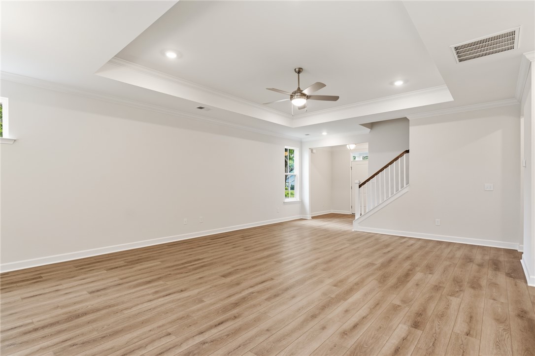110 Lakeside Drive Anderson, SC 29621 - Photo 9 of 34 This expansive room features beautiful flooring and bright lighting, perfect for everyday living.